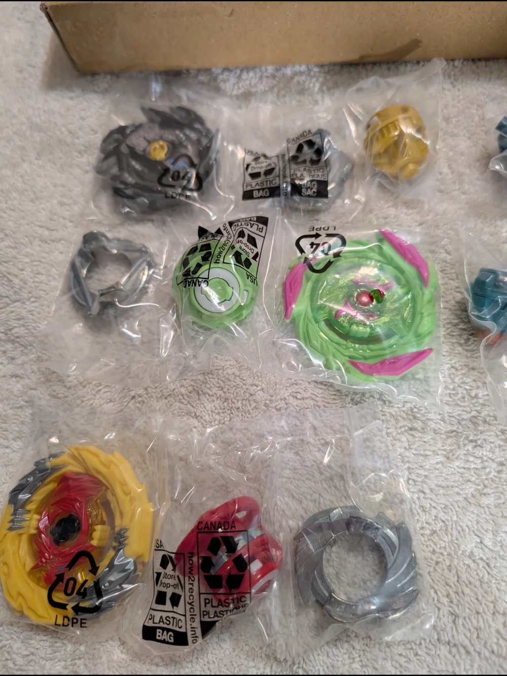 Hasbro Beyblader Blue Turbo Launcher and Assorted Burst Spinners